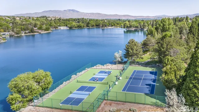 a aerial view of a house with a lake view