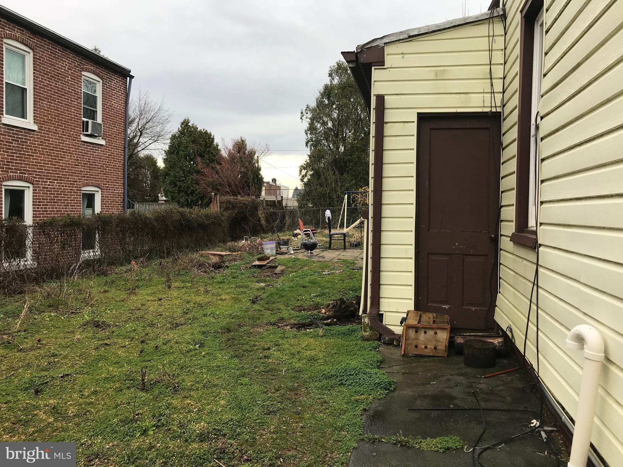 742 St Joseph Street Lancaster, PA 17603 - Photo 3 of 4 a front view of a house with garden