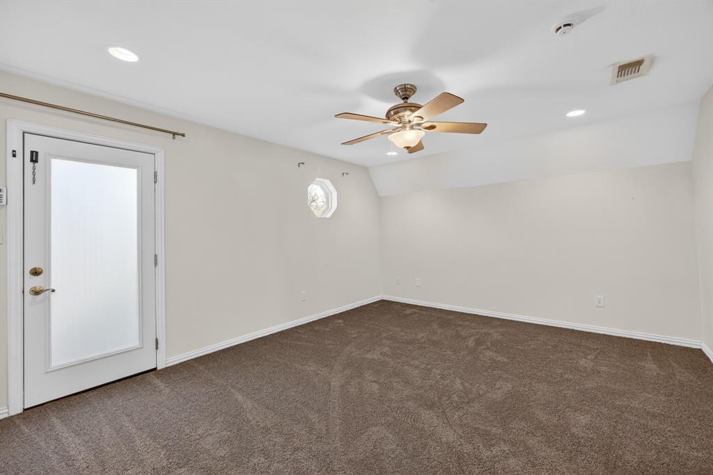 6775 Silver Creek Azle Road Azle, TX 76020 - Photo 18 of 40 Room featuring vaulted ceiling, dark colored carpet, recessed lighting, and ceiling fan