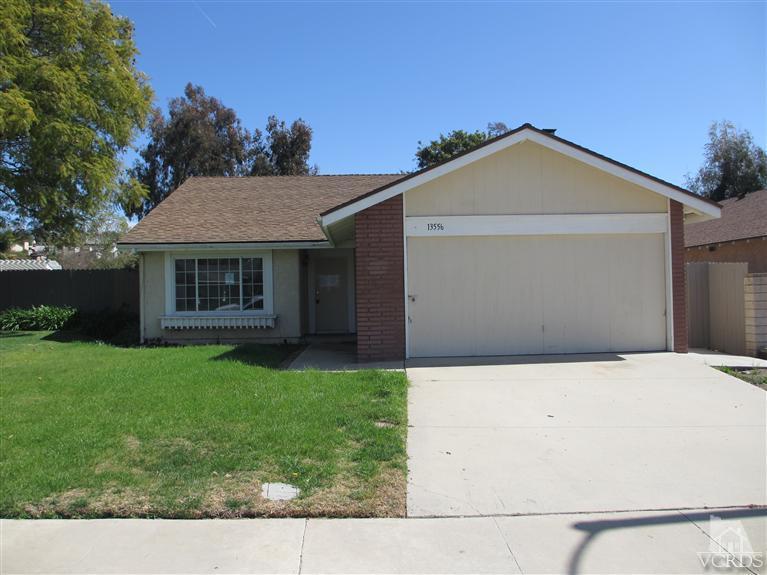 13556 East Quail Summit Road Moorpark, CA 93021 - Photo 1 of 8 a front view of a house with a yard
