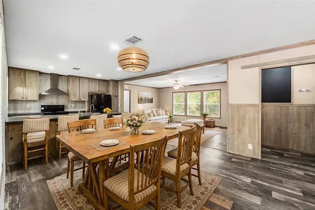 a view of a dining room with furniture