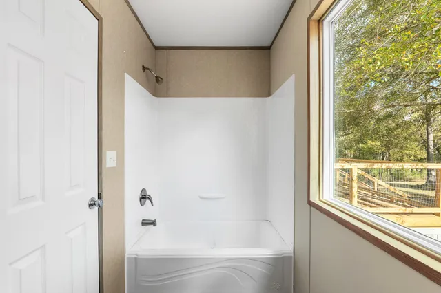 a view of a porch with wooden floor and roof