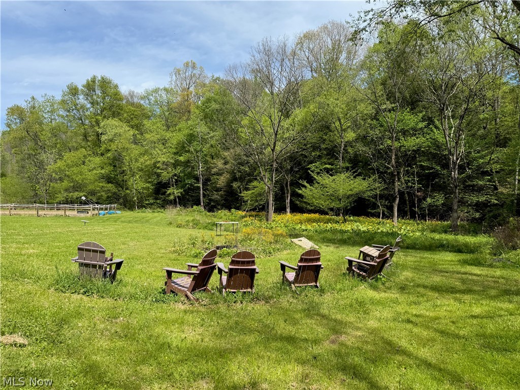 11811 Gaston Road Rogers, OH 44455 - Photo 10 of 38 You've got several acres of usable space, pole barns, and a Quonset Hut (currently used for recreation). Take advantage of the room to play, and play!!