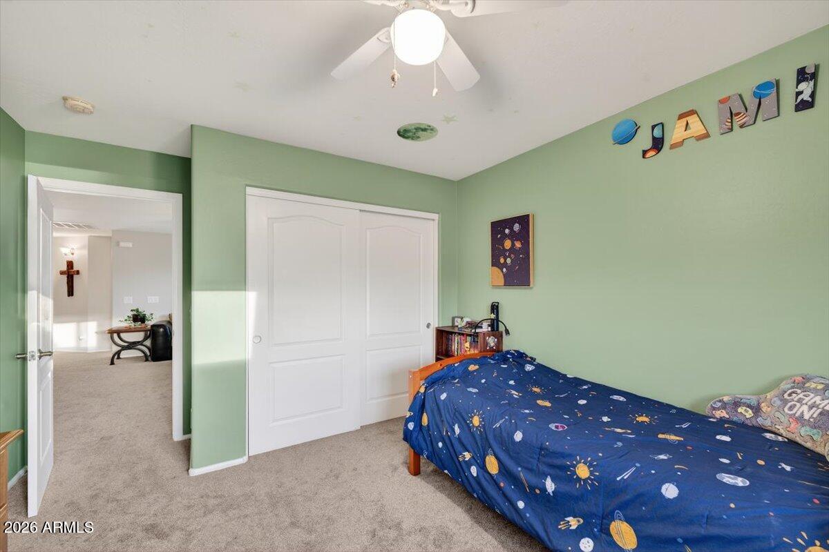 23913 North 23rd Way Phoenix, AZ 85024 - Photo 50 of 55 Kids Bedroom with Closet Storage