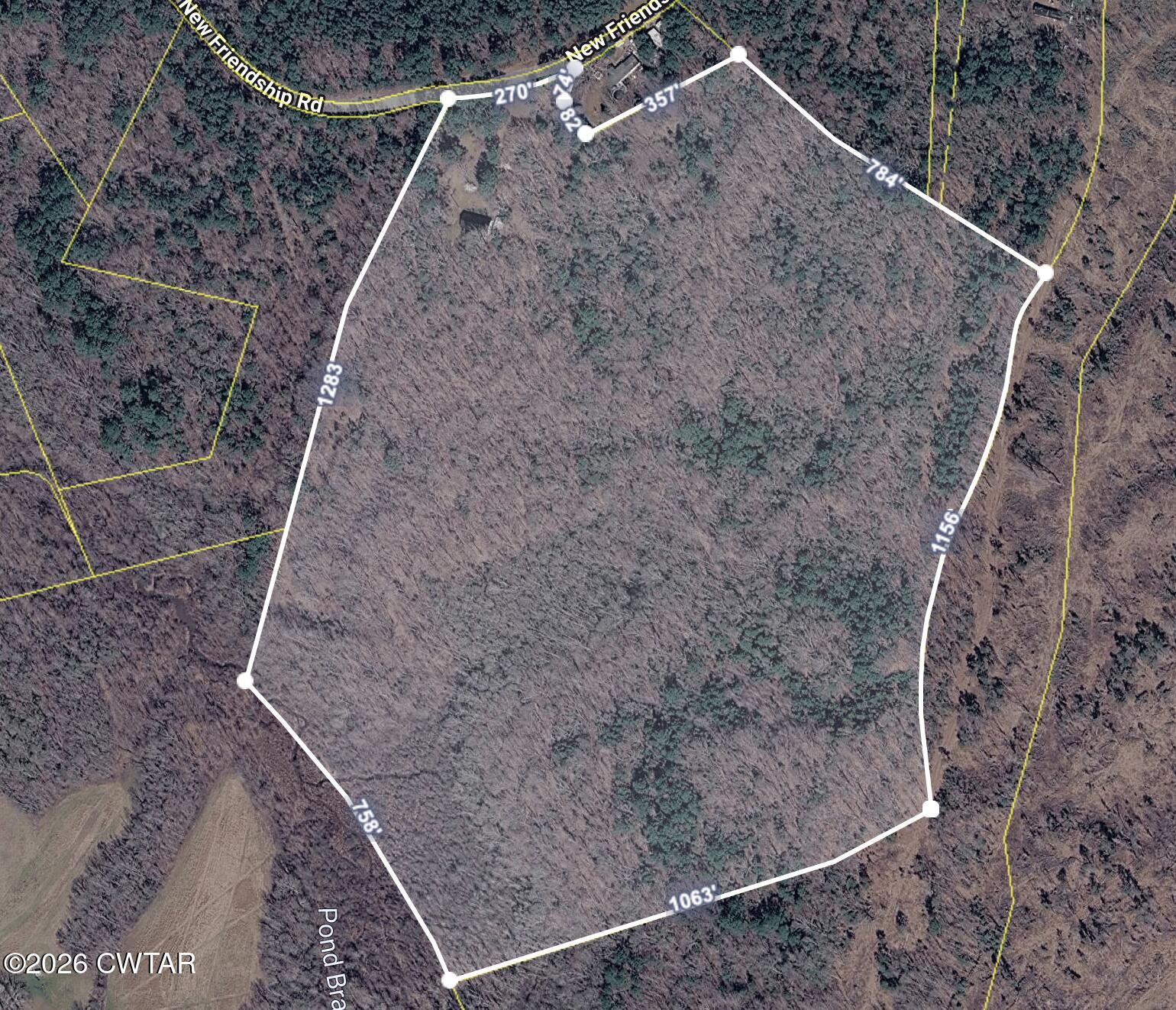 875 New Friendship Road Buena Vista, TN 38318 - Photo 13 of 13 a view of a dry yard with wooden fence