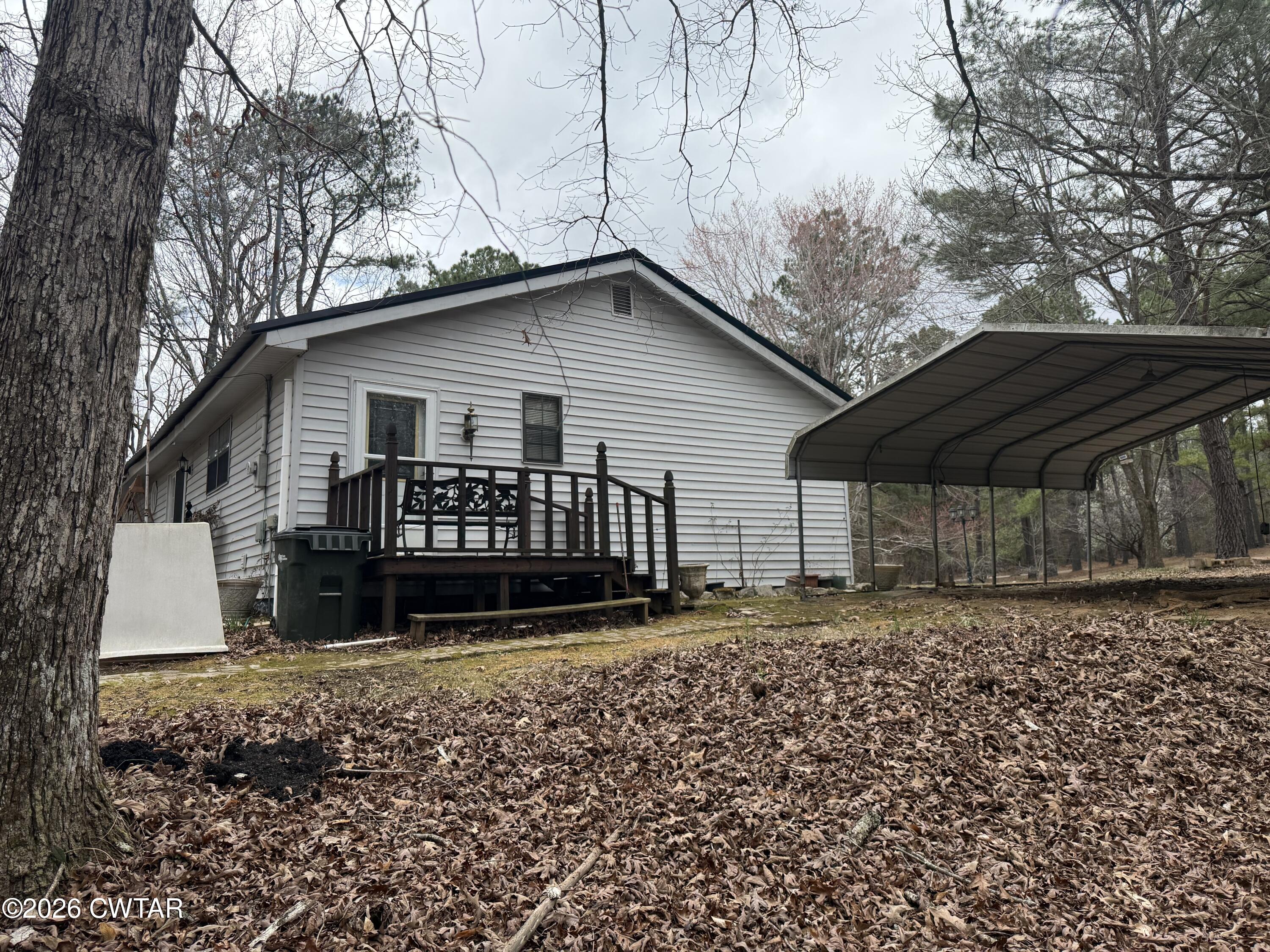 875 New Friendship Road Buena Vista, TN 38318 - Photo 4 of 13 a view of a house with a yard