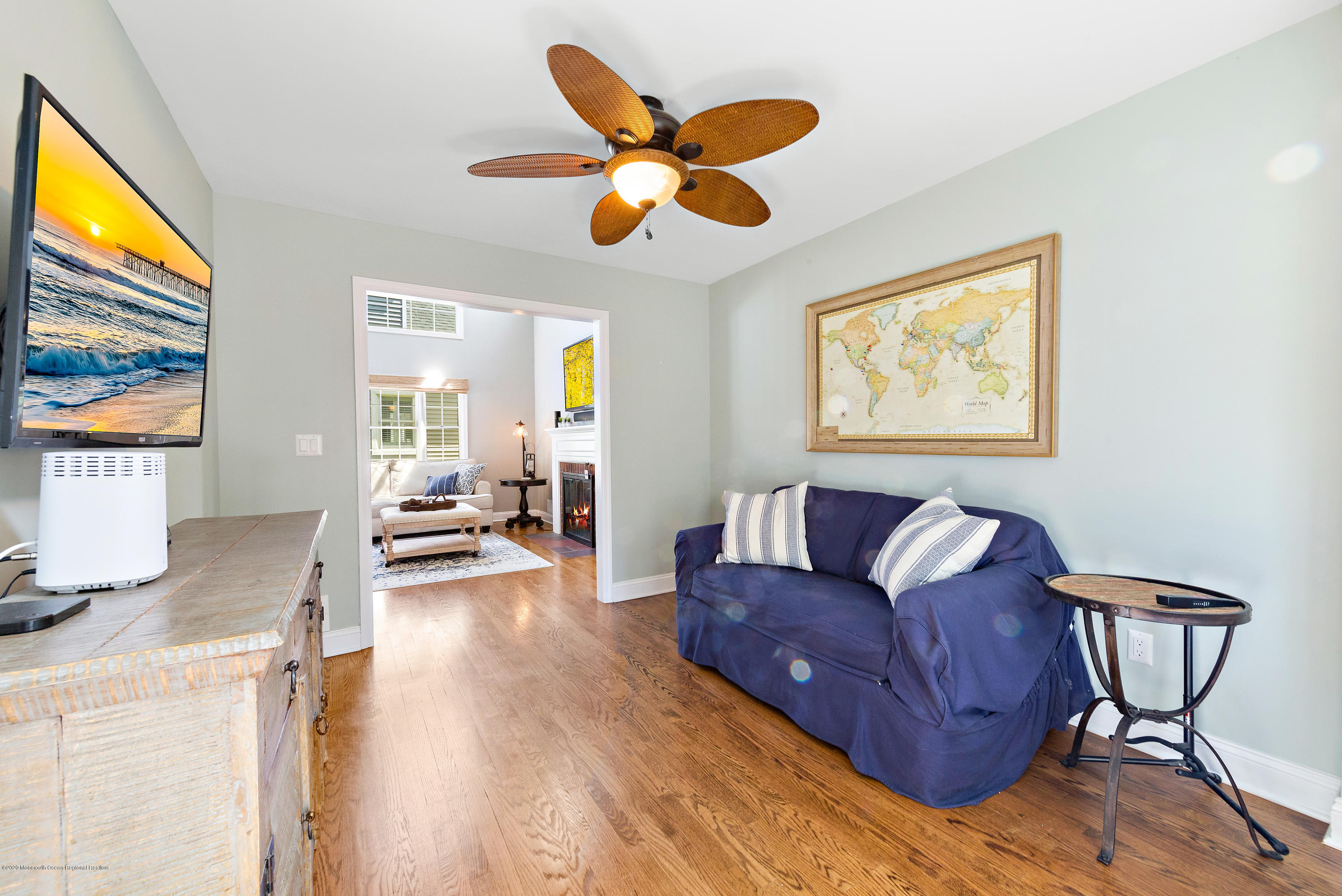 344 Euclid Avenue Manasquan, NJ 08736 - Photo 12 of 24 a living room with furniture a ceiling fan and a window