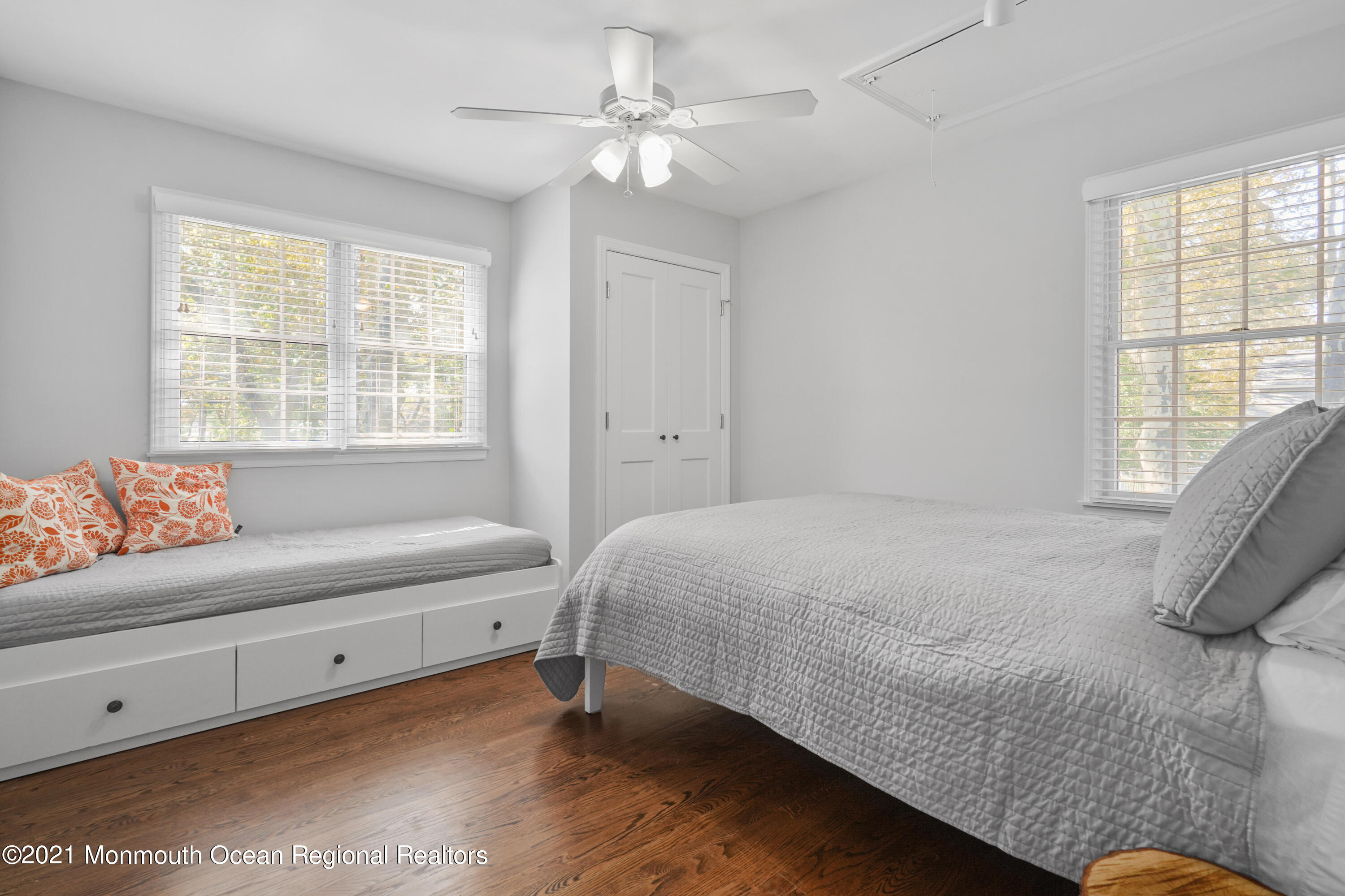 344 Euclid Avenue Manasquan, NJ 08736 - Photo 18 of 24 a bedroom with a bed and a couch