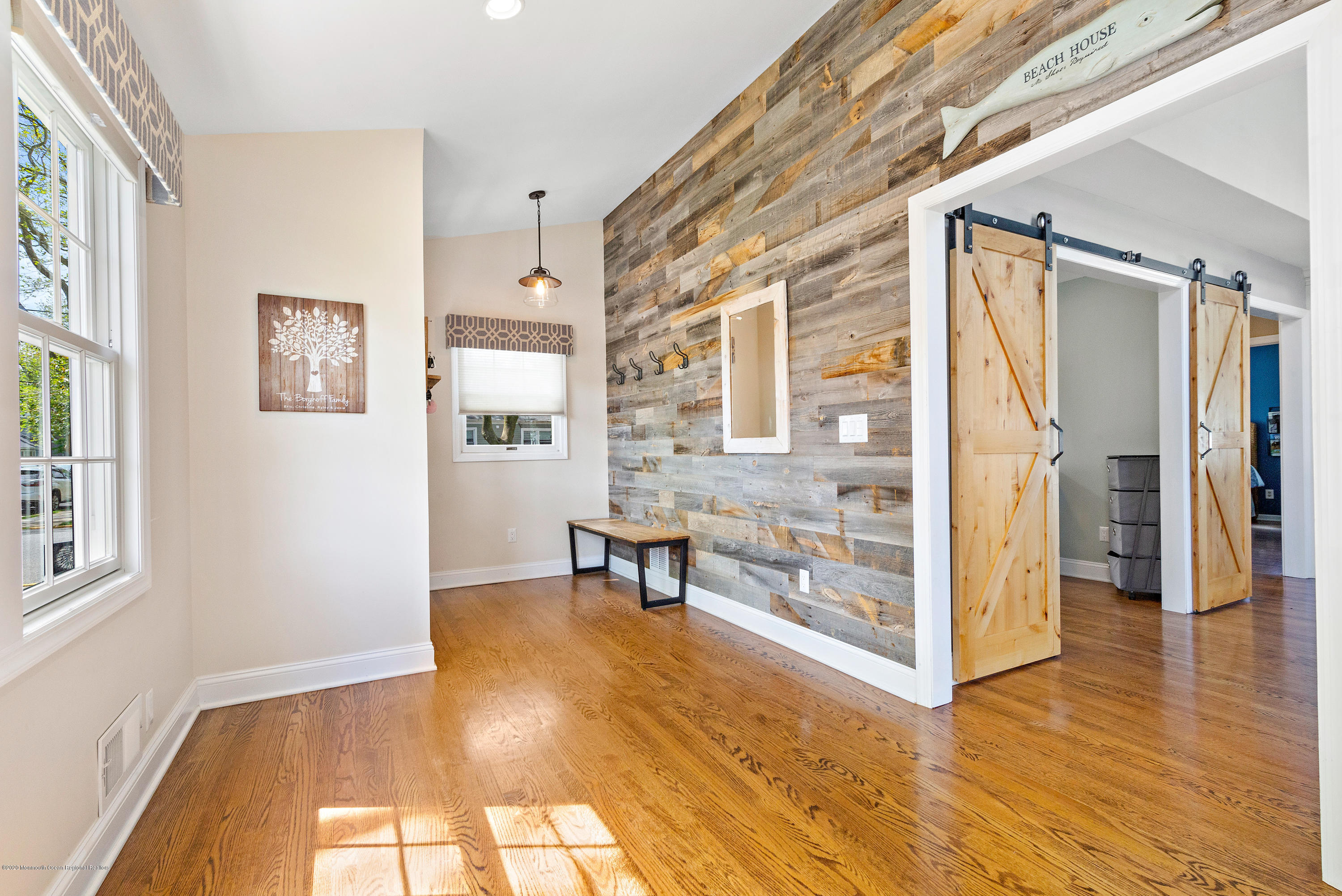 344 Euclid Avenue Manasquan, NJ 08736 - Photo 3 of 24 a view of an entryway with wooden floor and a window