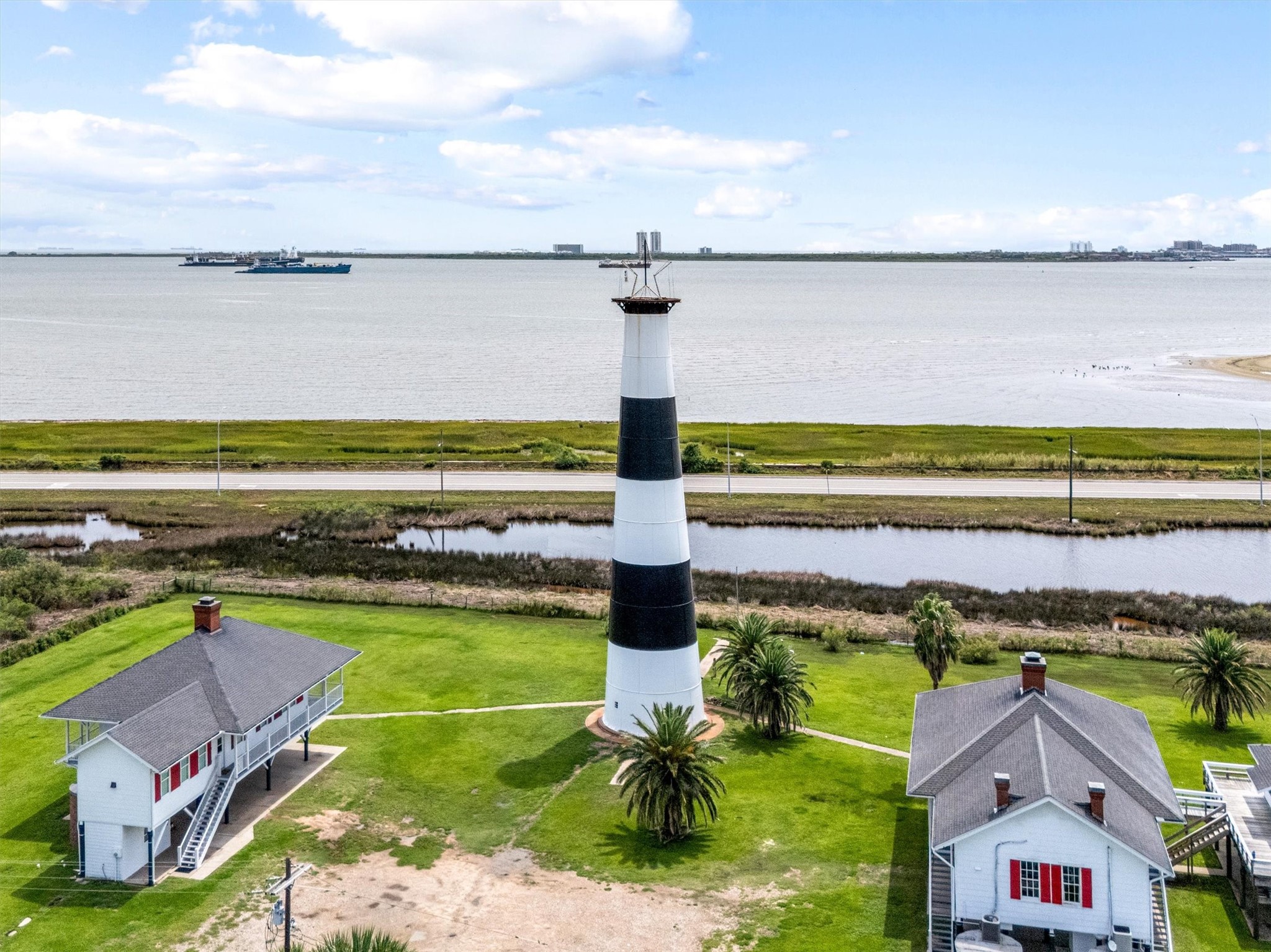 332 Atkinson Street Port Bolivar, TX 77650 - Photo 12 of 30 a view of a city with an ocean beach