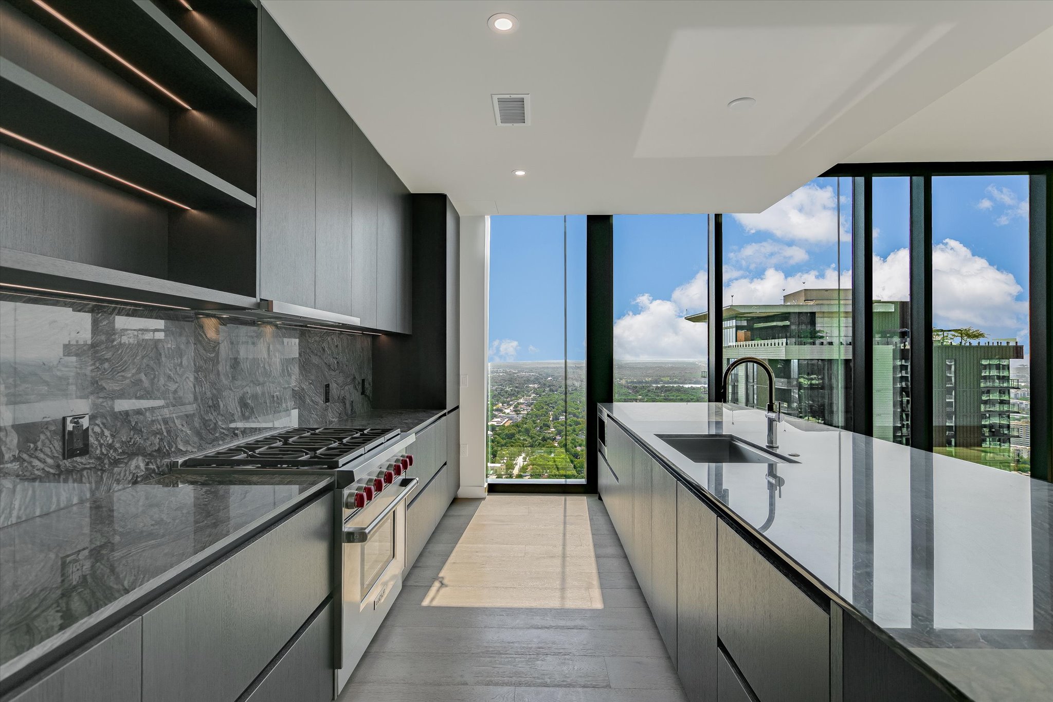 610 Davis Street, Unit 3801 Austin, TX 78701 - Photo 5 of 40 a view of a kitchen with a large window
