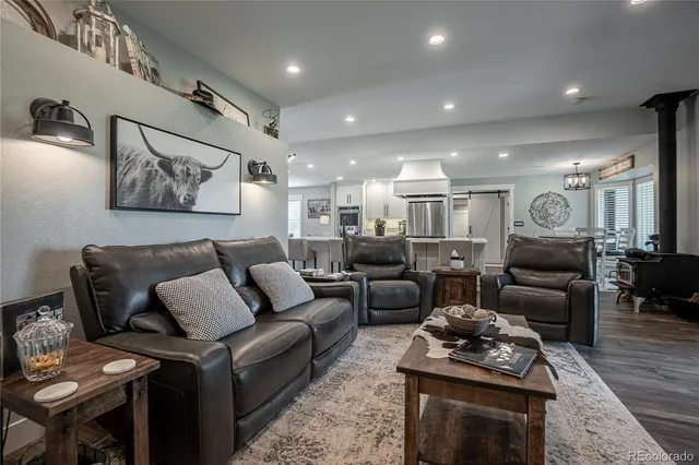 a spacious bedroom with a bed and furniture