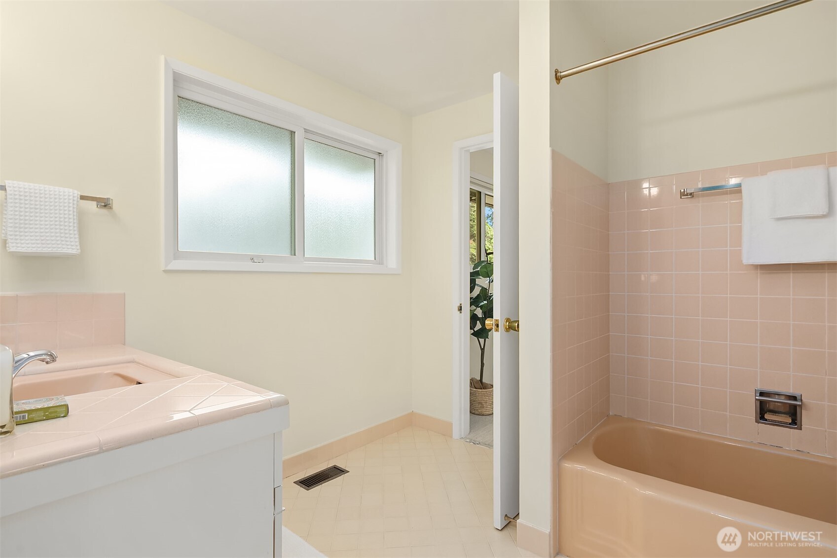 6555 Northeast Windermere Road Seattle, WA 98105 - Photo 28 of 40 a bathroom with a tub a sink and a shower