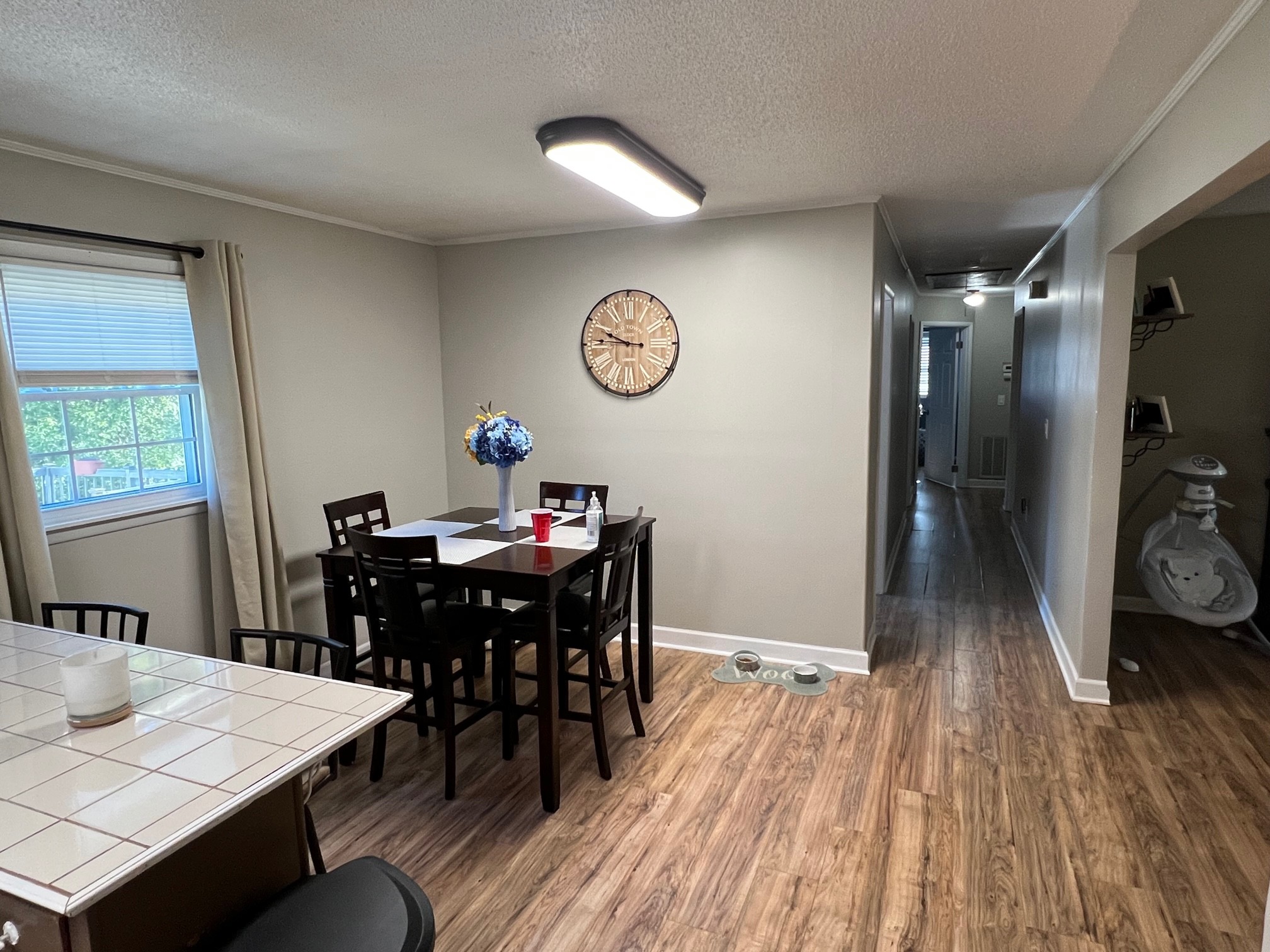 1415 Oak Grove Road Goodspring, TN 38460 - Photo 6 of 24 a view of a dining room with furniture and wooden floor