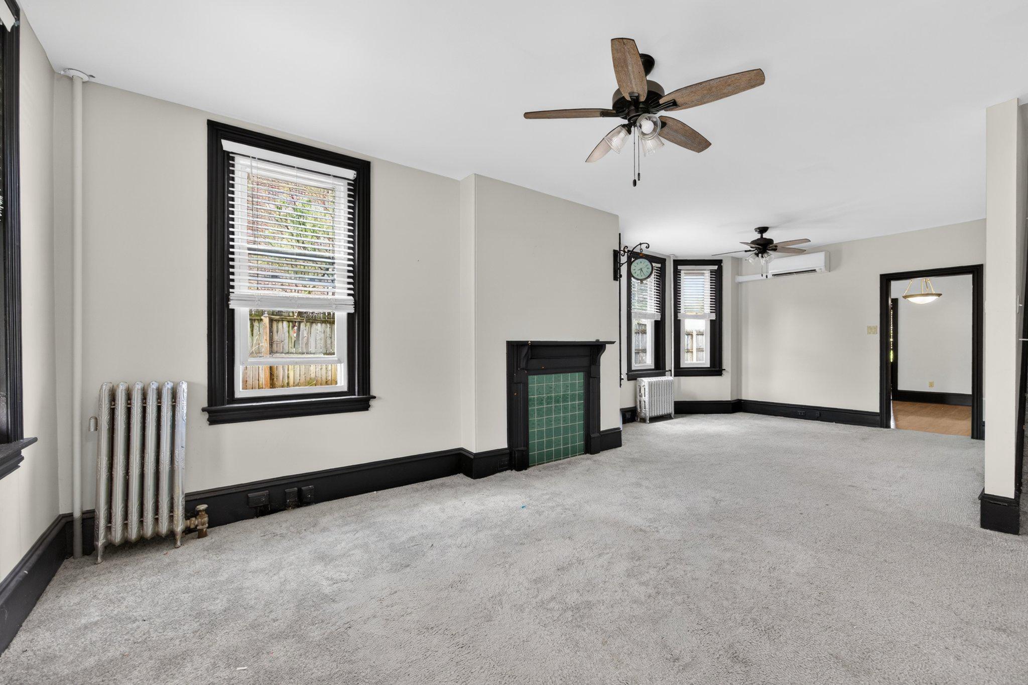 321 Walnut Street Spring City, PA 19475 - Photo 6 of 30 Spacious living area with classic charm.