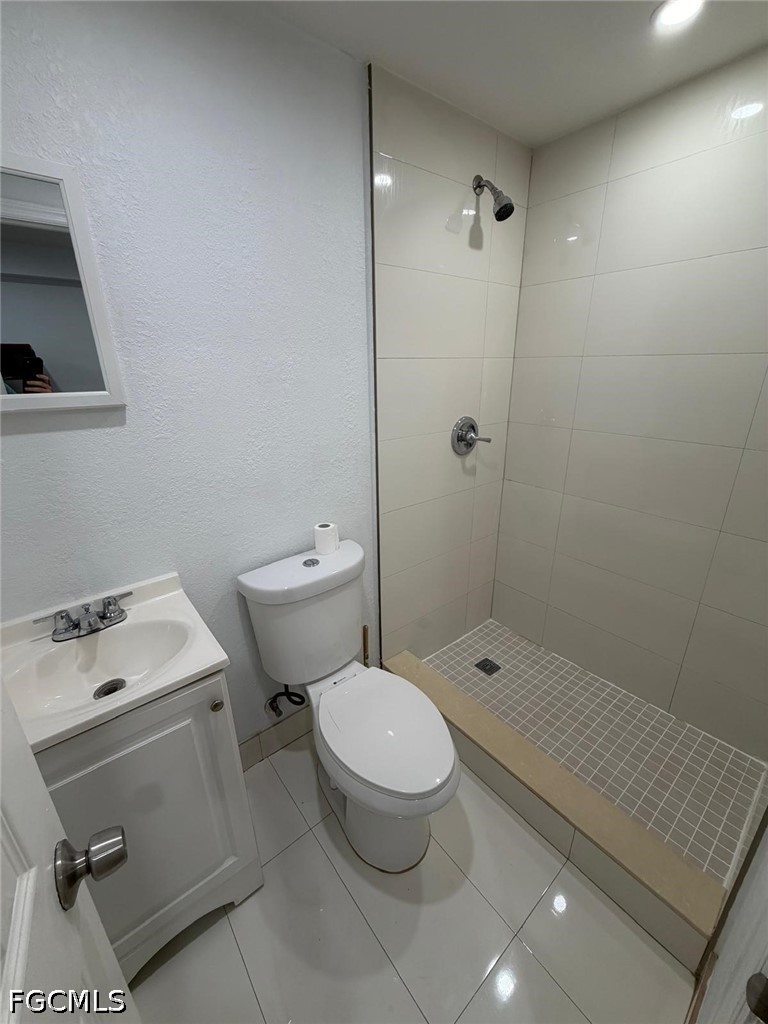 19360 Southwest 116th Avenue Miami, FL 33157 - Photo 3 of 4 a bathroom with a toilet a sink and shower