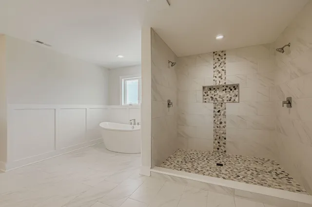 a bathroom with a shower and a toilet