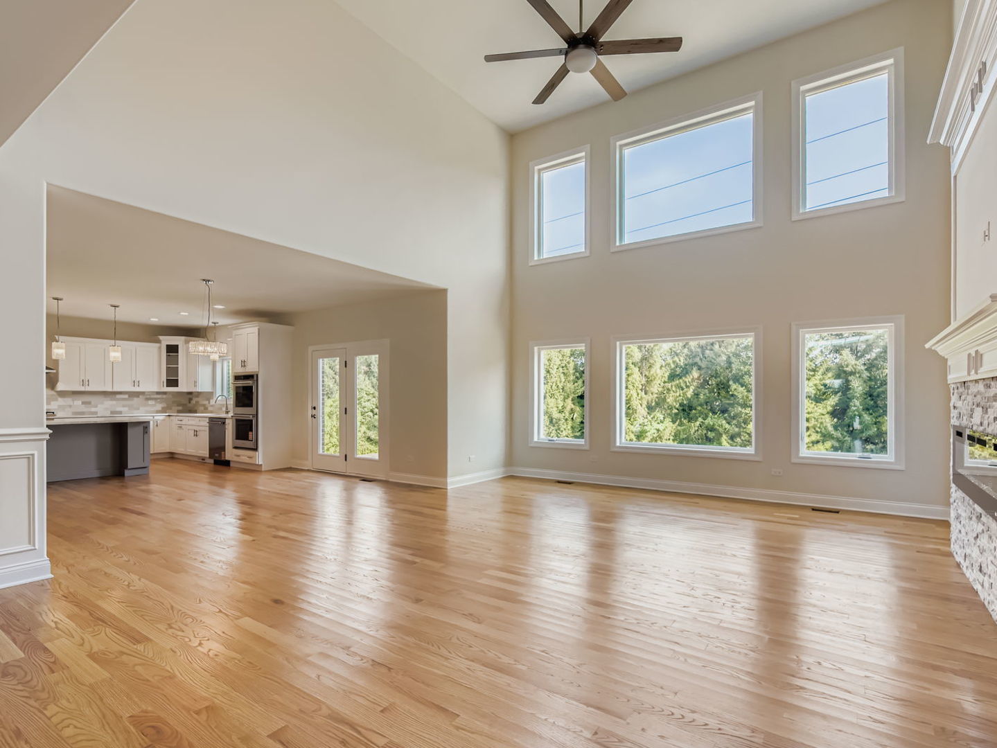 24760 South Hickory Court Crete, IL 60417 - Photo 7 of 15 a view of empty room with wooden floor and fireplace