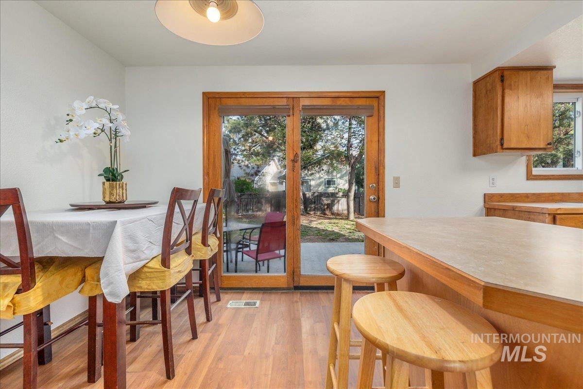 236 East Bayview Court Boise, ID 83706 - Photo 11 of 49 Dining room featuring light wood-style floors