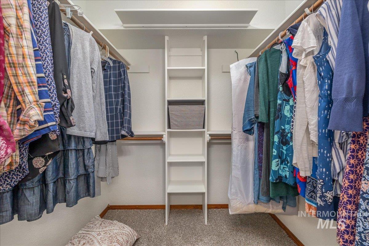 236 East Bayview Court Boise, ID 83706 - Photo 31 of 49 Walk in closet with light carpet