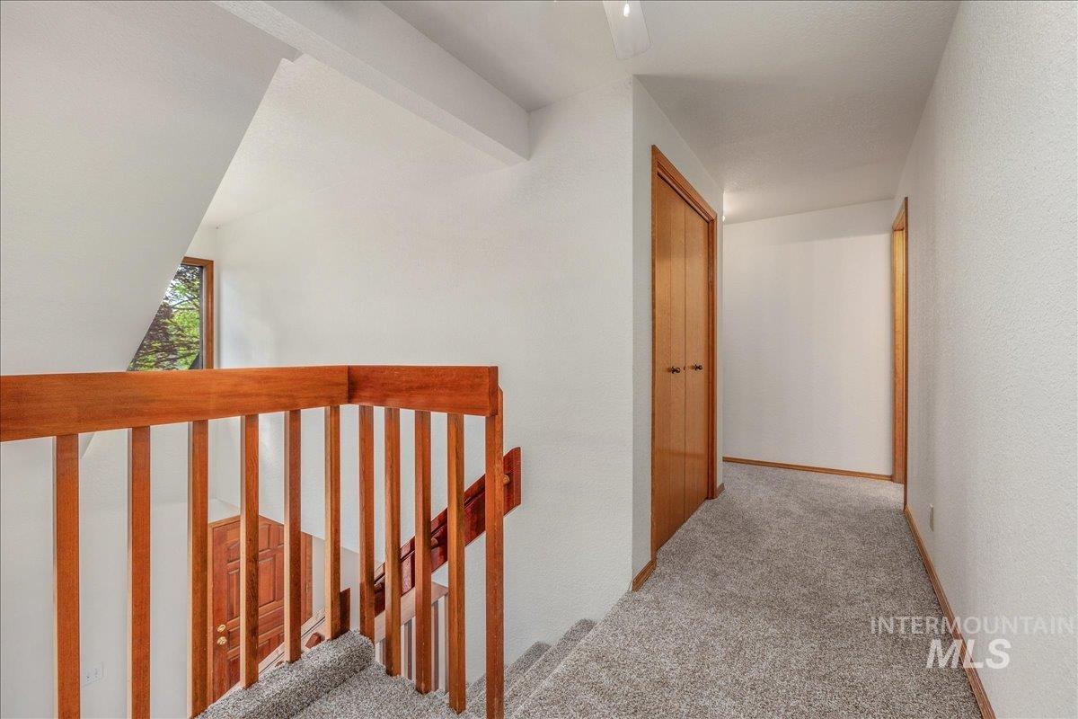 236 East Bayview Court Boise, ID 83706 - Photo 37 of 49 Hallway with light carpet