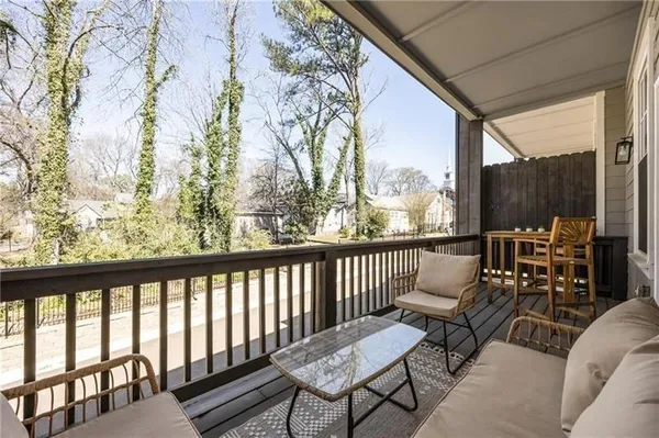 a view of a house with pool and wooden floor