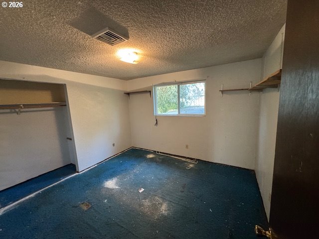 560 St John Street Sutherlin, OR 97479 - Photo 16 of 43 a view of an empty room with wooden floor and a window