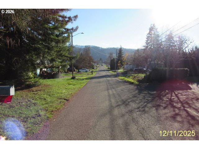 560 St John Street Sutherlin, OR 97479 - Photo 3 of 43 a view of a park with large trees