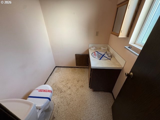 560 St John Street Sutherlin, OR 97479 - Photo 32 of 43 a hallway with a cabinet and a couch