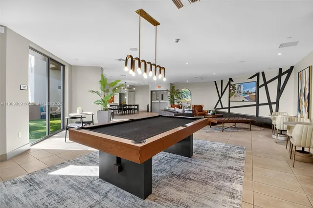 a view of a living room and kitchen