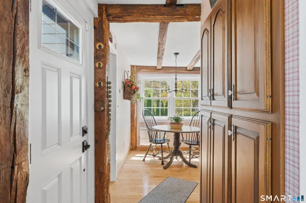 a view of a dining room with furniture window and outside view
