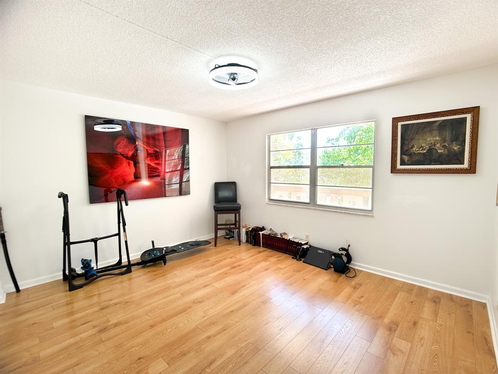 4301 Martinique Circle, Unit H2 Coconut Creek, FL 33066 - Photo 14 of 37 Guest Bedroom