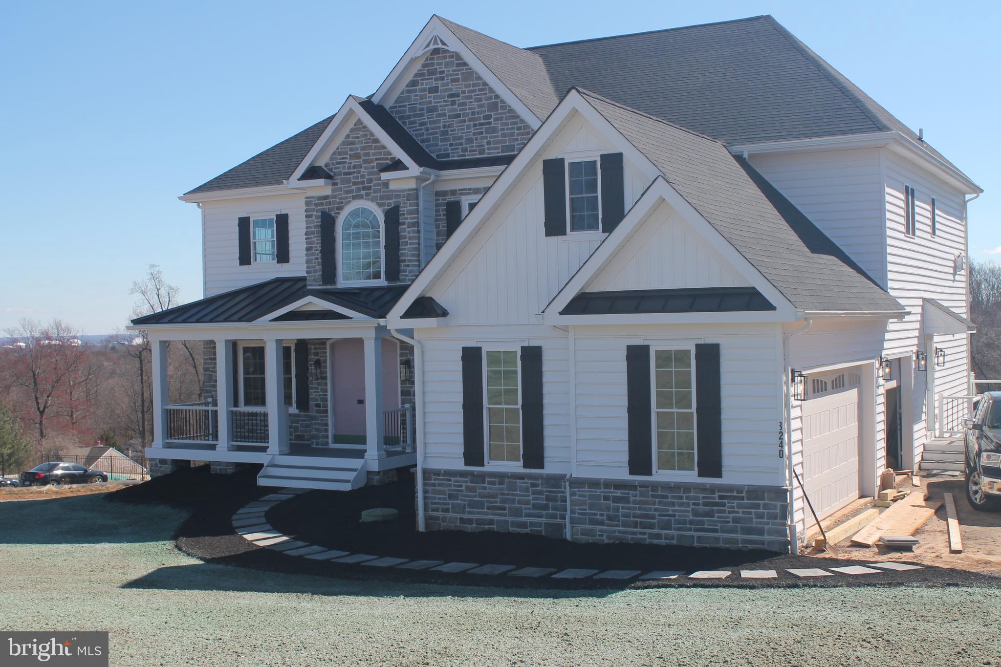 66 Kirk Road Garnet Valley, PA 19060 - Photo 11 of 37 a front view of a house with a yard
