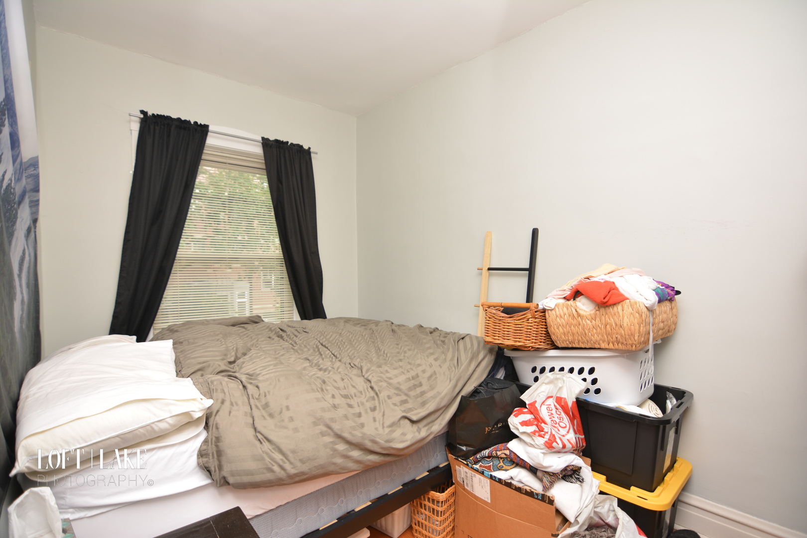 1609 West Grace Street, Unit 2 Chicago, IL 60613 - Photo 3 of 10 a bedroom with a bed and wooden floor