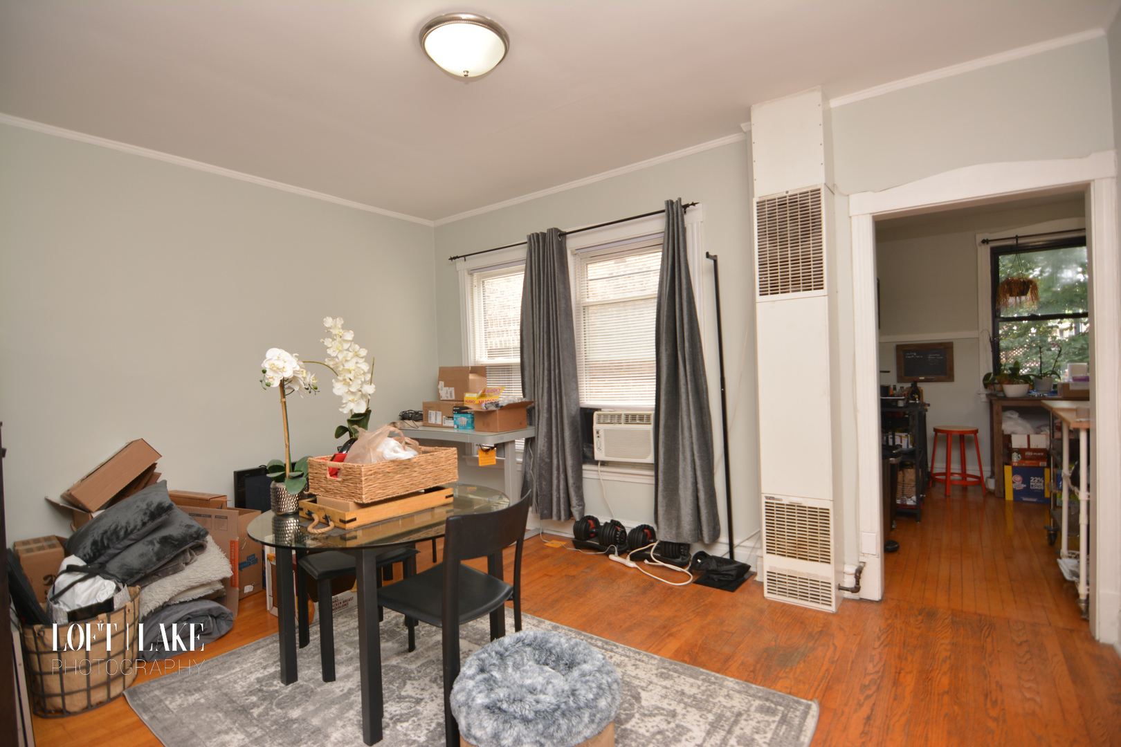 1609 West Grace Street, Unit 2 Chicago, IL 60613 - Photo 4 of 10 a view of a livingroom with furniture and front door