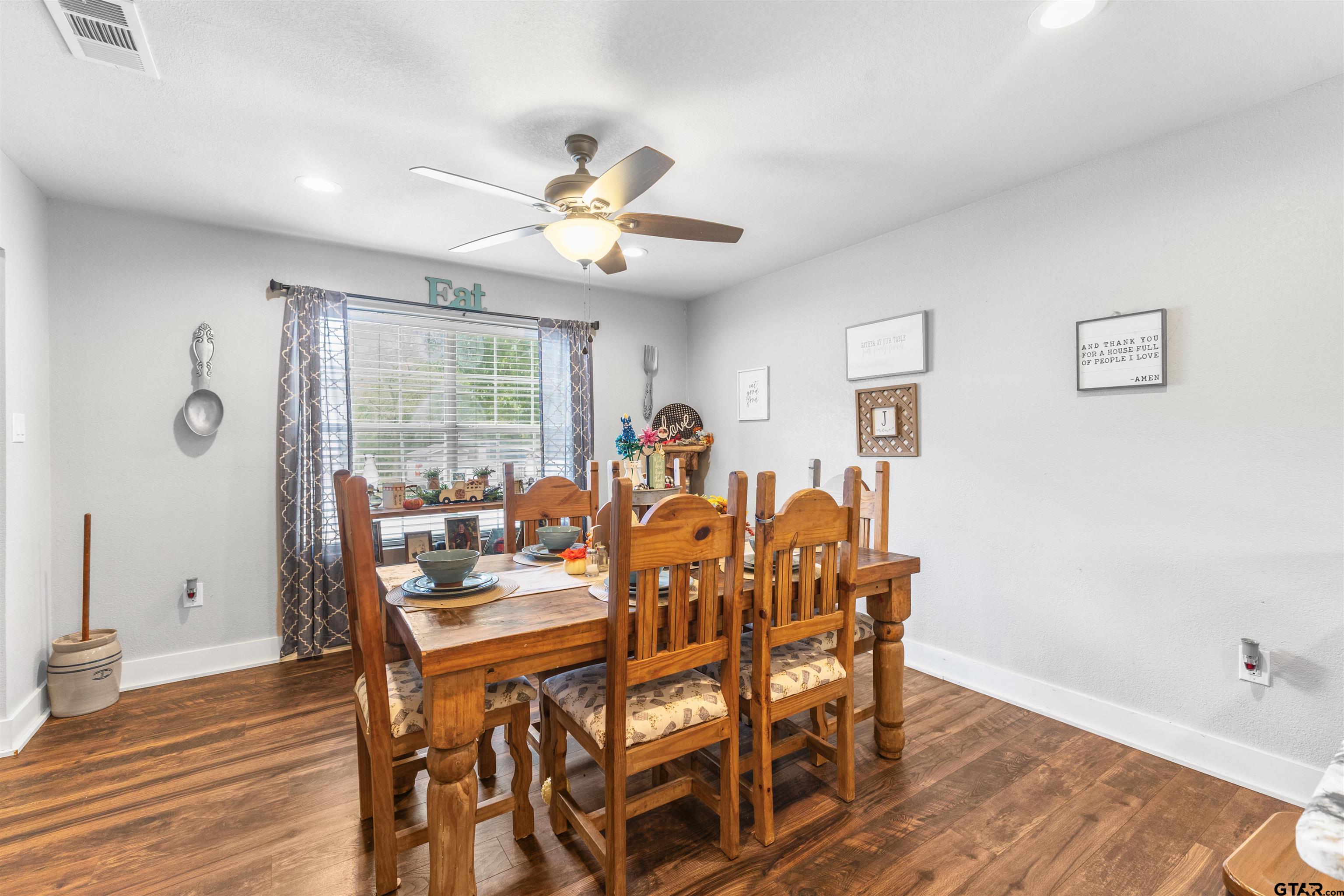106 Pecan Ridge Mount Vernon, TX 75457 - Photo 8 of 31 a view of a dining room with furniture window and wooden floor