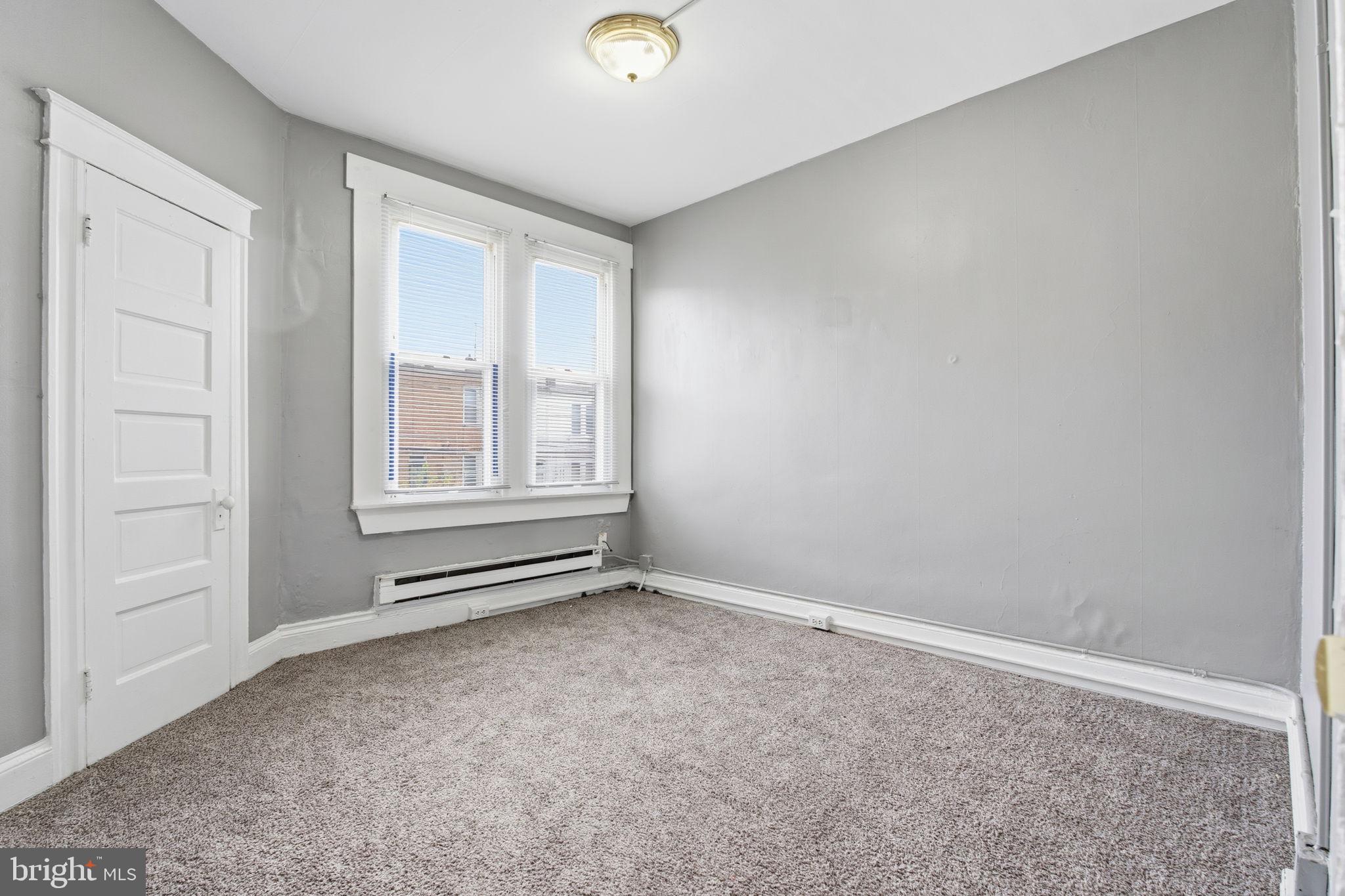 5 South Wickham Road Baltimore, MD 21229 - Photo 13 of 28 an empty room with windows