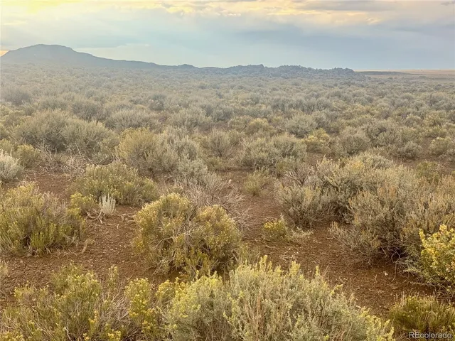 a view of mountain view with mountains in the background