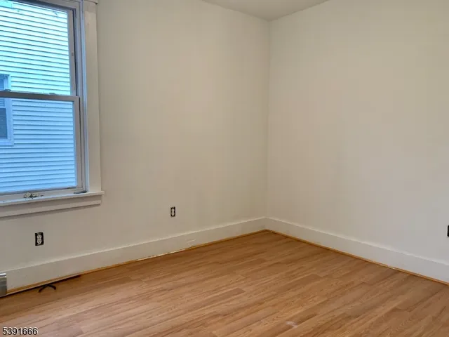 a room and a hard wood floor