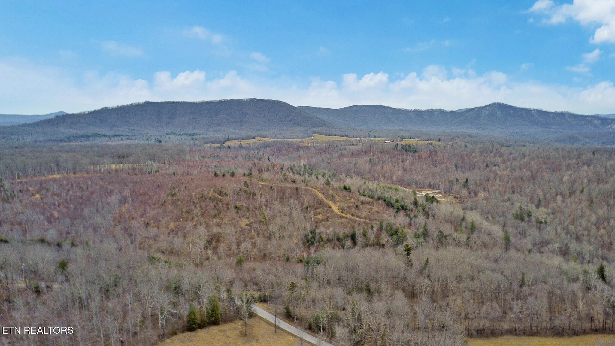 12043 East Mill Creek Road Sunbright, TN 37872 - Photo 5 of 5 a view of mountain and sunset