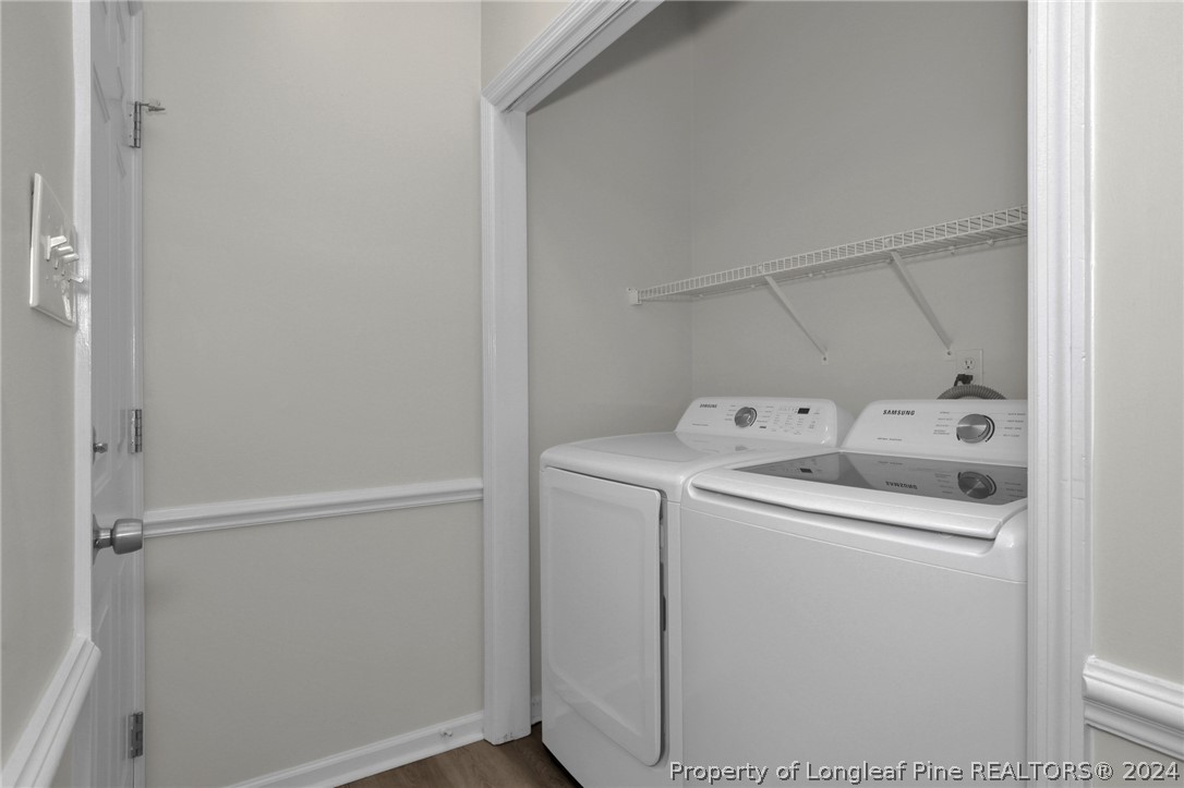 4780 Deer Lakes Road Fayetteville, NC 28311 - Photo 18 of 36 a utility room with dryer and washer