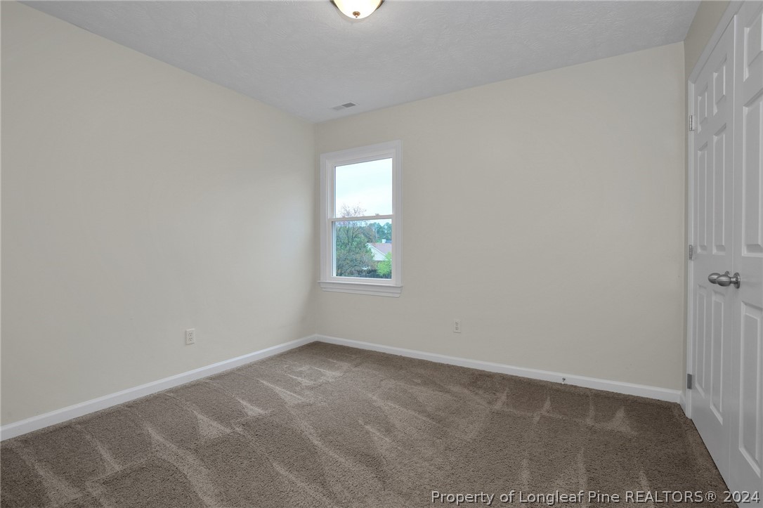 4780 Deer Lakes Road Fayetteville, NC 28311 - Photo 21 of 36 an empty room with a window