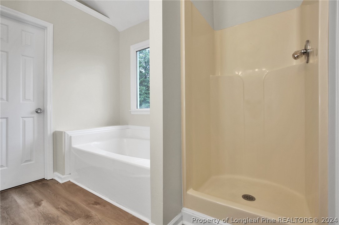 4780 Deer Lakes Road Fayetteville, NC 28311 - Photo 27 of 36 a bathroom with a bathtub