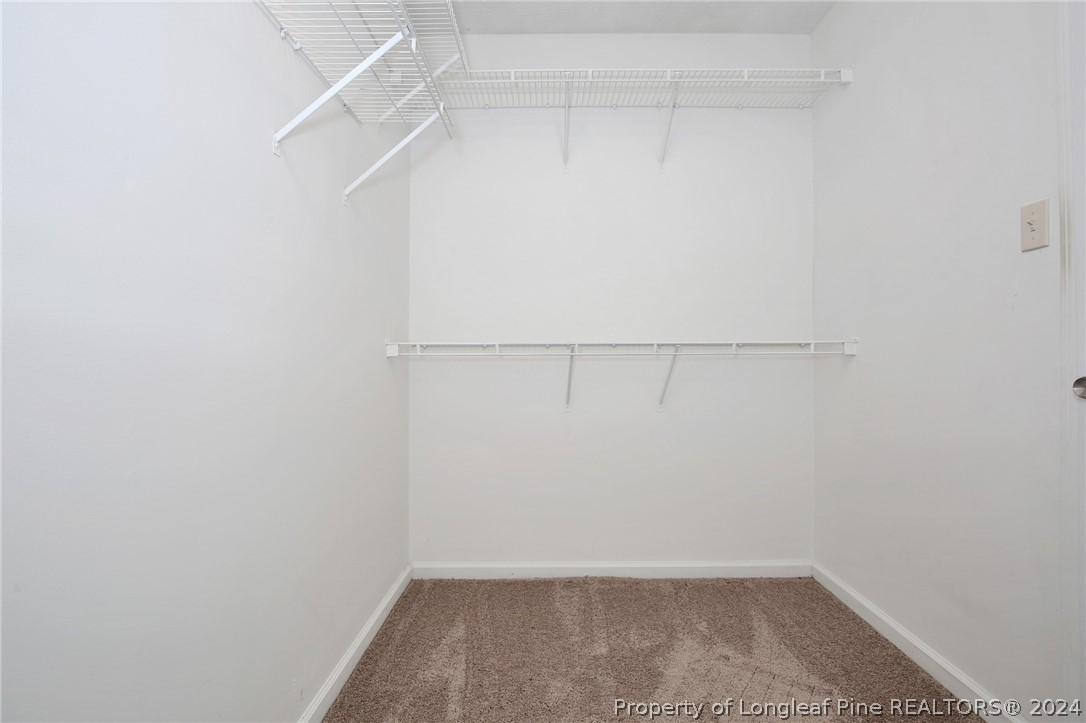 4780 Deer Lakes Road Fayetteville, NC 28311 - Photo 28 of 36 a view of a room with racks on the wall
