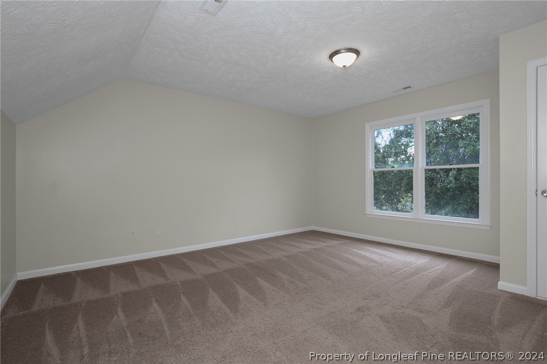 4780 Deer Lakes Road Fayetteville, NC 28311 - Photo 29 of 36 an empty room with windows