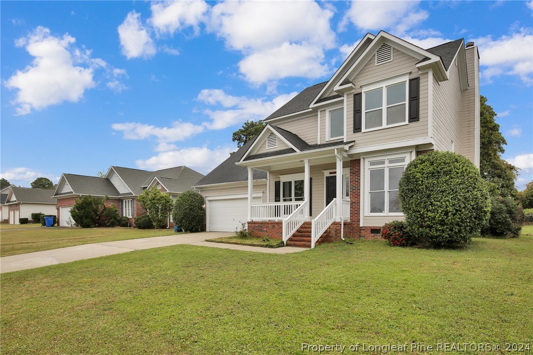 4780 Deer Lakes Road Fayetteville, NC 28311 - Photo 3 of 36 a view of a house with a yard