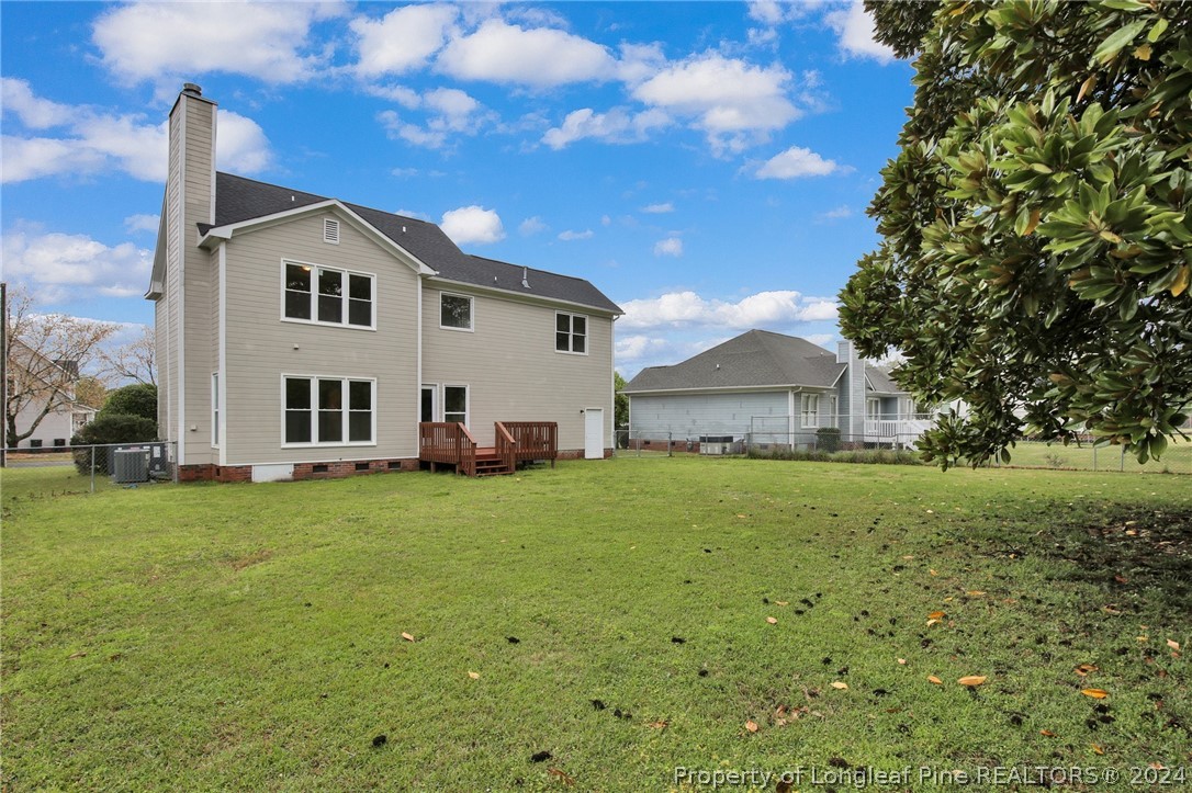 4780 Deer Lakes Road Fayetteville, NC 28311 - Photo 33 of 36 a view of a house with a yard