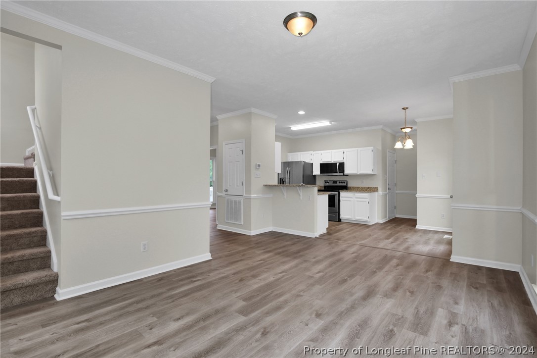 4780 Deer Lakes Road Fayetteville, NC 28311 - Photo 7 of 36 a view of kitchen with wooden floor