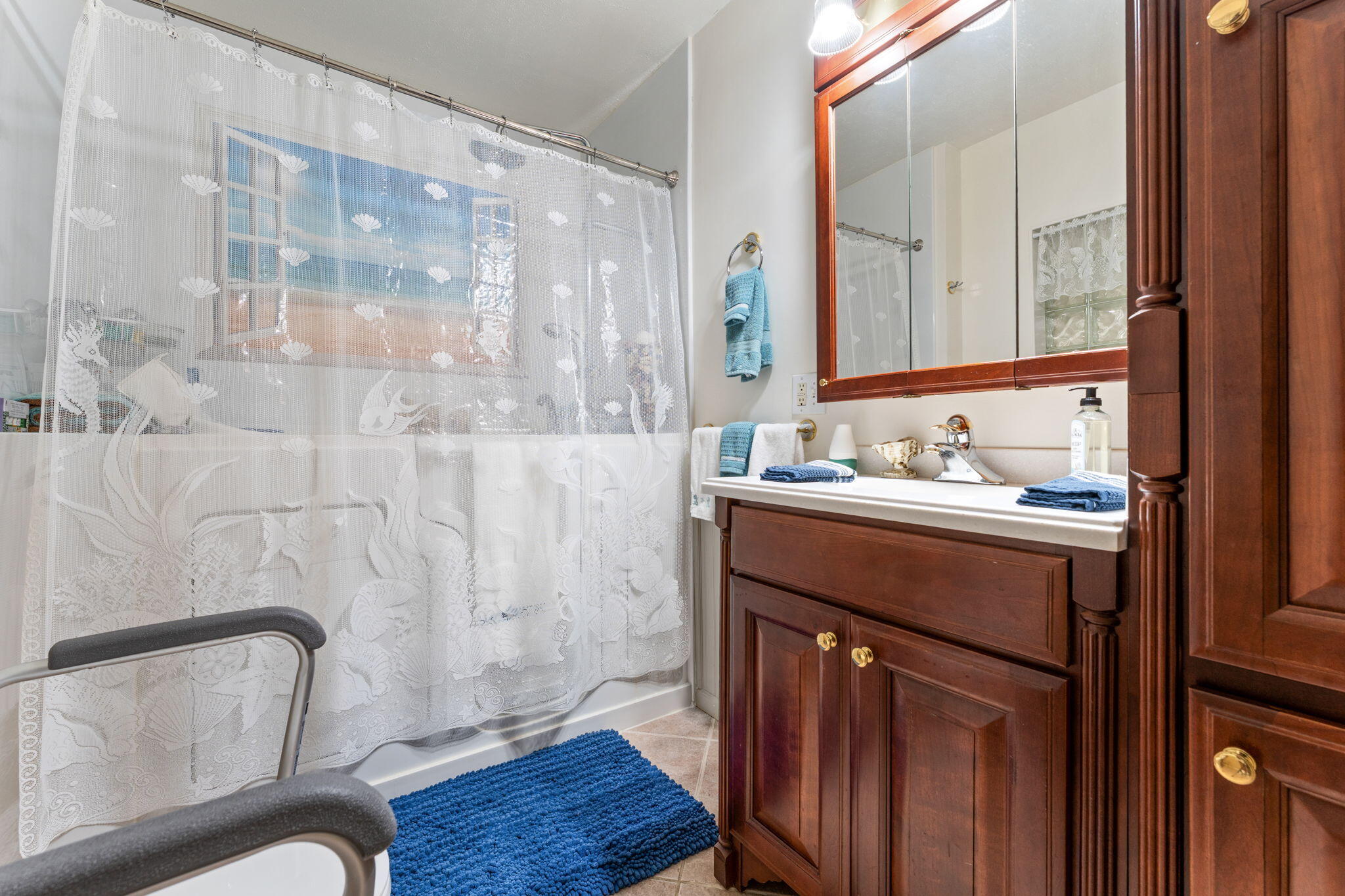 138 McClung Road La Porte, IN 46350 - Photo 15 of 50 a bathroom with a sink and a mirror