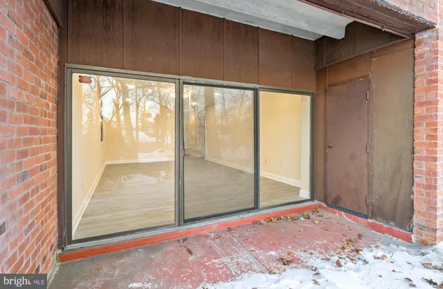 a view of a living room and dining room